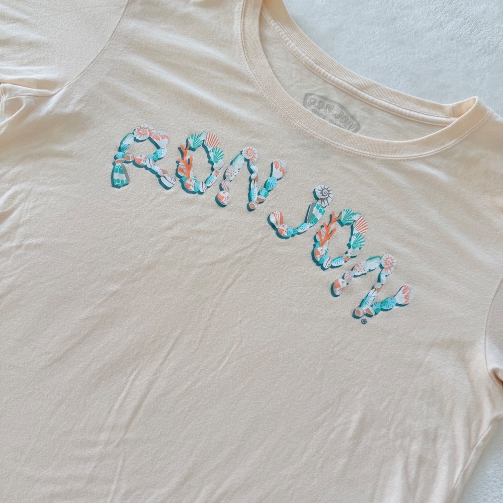 Ron Jon Surf Shop Womens Small Peach Seashell Logo Graphic T-Shirt Raw‎ Hem Boxy